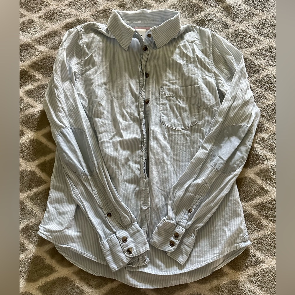 Light blue striped button down shirt with patches on elbows